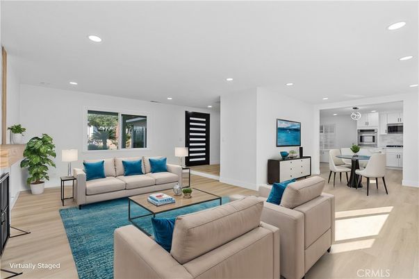 Dining room, Fireplace, Interior, Kitchen, Living room, Recessed Lighting, Stainless Steel Appliances, Wood Texture Flooring