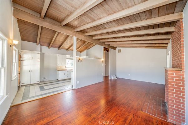 Empty room, Fireplace, Interior, Stone Walls, Wooden Beams, Wooden Ceilings, Wood Texture Flooring