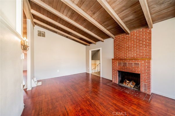 Empty room, Fireplace, Interior, Stone Walls, Wooden Beams, Wooden Ceilings, Wood Texture Flooring