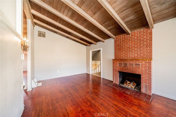 Empty room, Fireplace, Interior, Stone Walls, Wooden Beams, Wooden Ceilings, Wood Texture Flooring