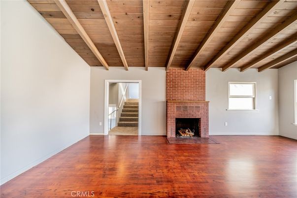 Empty room, Fireplace, Interior, Stone Walls, Wooden Beams, Wooden Ceilings, Wood Texture Flooring