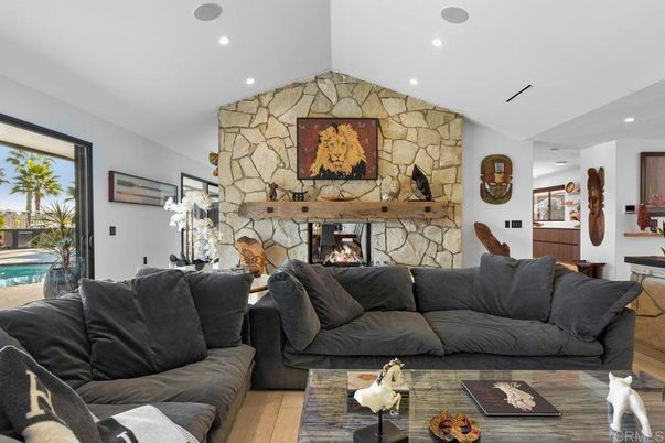 Fireplace, Interior, Living room, Recessed Lighting, Stone Walls, Wood Texture Flooring