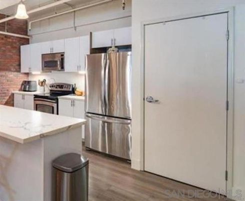 Interior, Kitchen, Pendant Lights, Stainless Steel Appliances, Stone Walls, Wood Texture Flooring