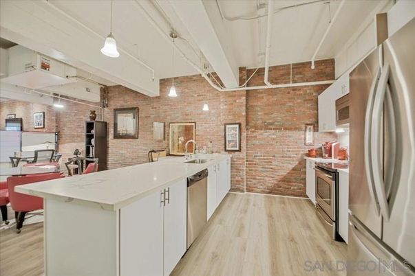 Interior, Kitchen, Pendant Lights, Stainless Steel Appliances, Stone Walls, Wood Texture Flooring