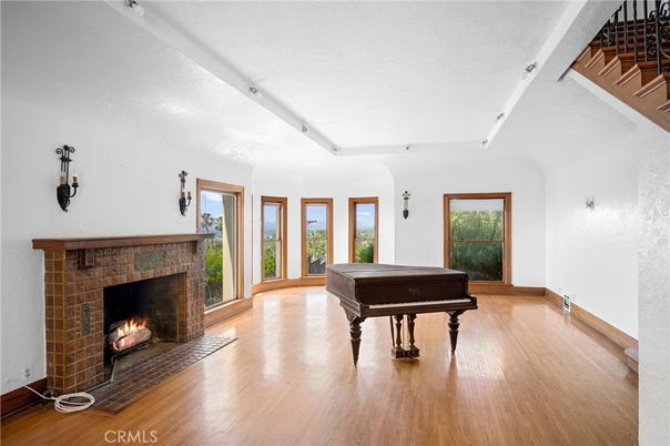 Billiard Table, Fireplace, Game Room, Interior, Piano, Wood Texture Flooring