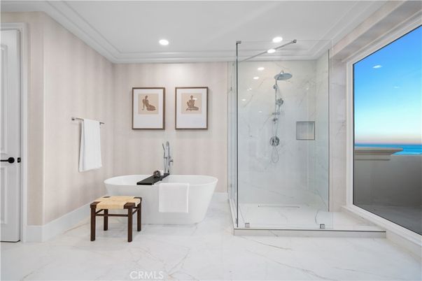 Bathroom, Free Standing Baths, Glass Shower, Interior, Marble, Marble Walls, Recessed Lighting, Water