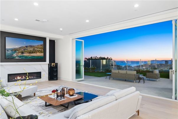 Fireplace, Interior, Living room, Recessed Lighting, Water, Wood Texture Flooring