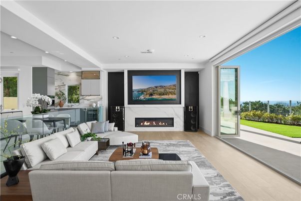 Dining room, Fireplace, Interior, Living room, Marble Walls, Recessed Lighting, Wood Texture Flooring