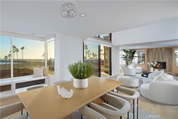 Dining room, Fireplace, Interior, Living room, Recessed Lighting, Water, Wood Texture Flooring
