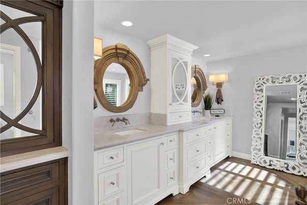 Bathroom, Dual Sink Vanities, Interior, Recessed Lighting, Wood Texture Flooring