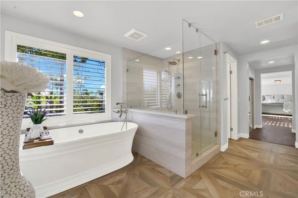 Bathroom, Free Standing Baths, Glass Shower, Interior, Recessed Lighting, Wood Texture Flooring