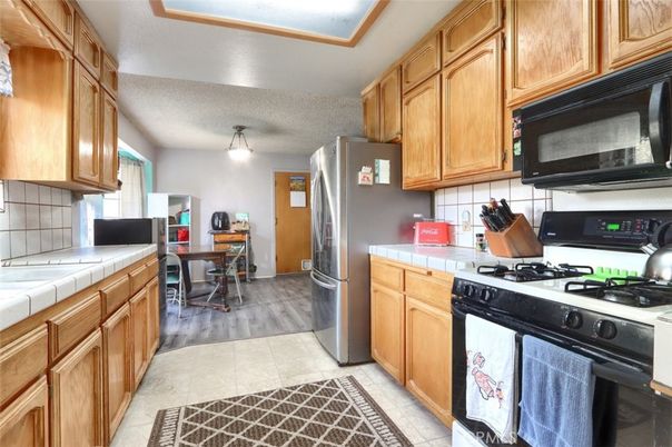 Dining room, Interior, Kitchen, Tile Countertops, Wood Texture Flooring