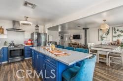 Dining room, Interior, Kitchen, Living room, Pendant Lights, Stainless Steel Appliances, Wood Texture Flooring