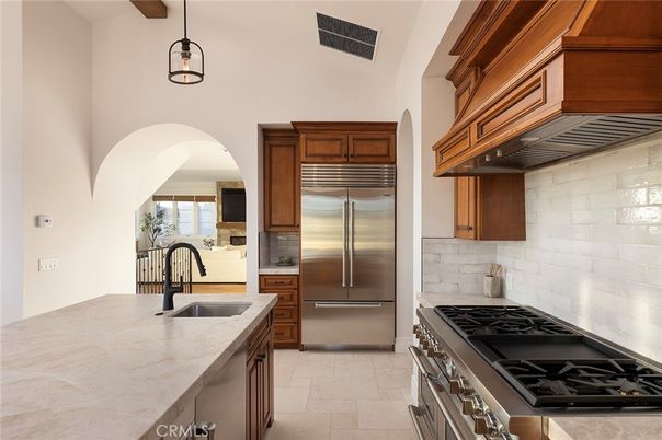 Interior, Kitchen, Pendant Lights, Stainless Steel Appliances, Stone Walls