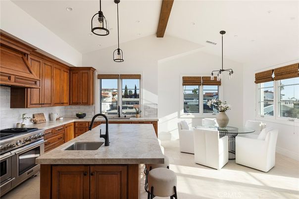 Dining room, Interior, Kitchen, Pendant Lights, Recessed Lighting, Stainless Steel Appliances, Water, Wooden Beams