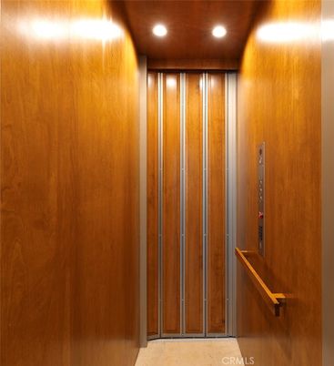 Elevator, Interior, Recessed Lighting, Wooden Ceilings, Wooden Walls