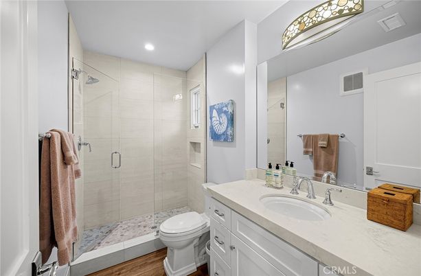 Bathroom, Glass Shower, Interior, Recessed Lighting, Wood Texture Flooring