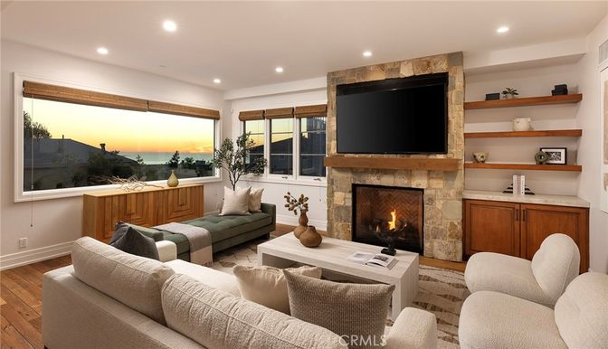 Fireplace, Interior, Living room, Recessed Lighting, Water, Wood Texture Flooring