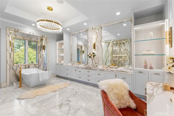 Bathroom, Chandelier, Dual Sink Vanities, Free Standing Baths, Interior, Marble, Marble Walls, Recessed Lighting