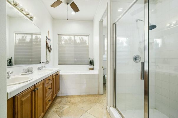 Bathroom, Dual Sink Vanities, Glass Shower, Interior, Recessed Lighting, Tile Countertops
