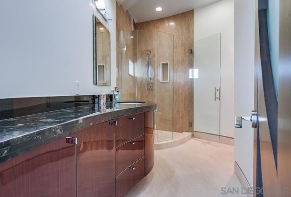 Bathroom, Dual Sink Vanities, Glass Shower, Interior, Recessed Lighting, Wood Texture Flooring