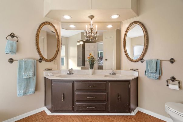 Bathroom, Chandelier, Dual Sink Vanities, Interior, Recessed Lighting, Wood Texture Flooring