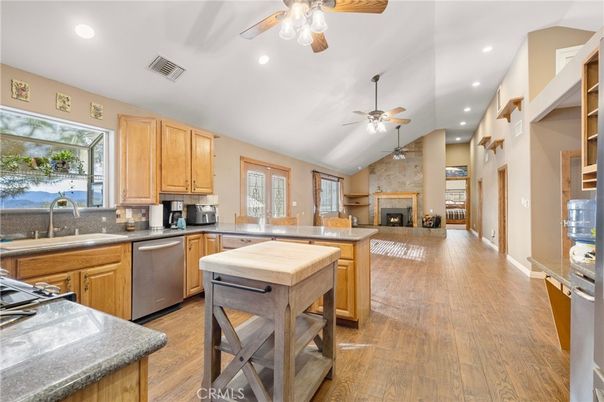 Fireplace, Interior, Kitchen, Recessed Lighting, Stone Walls, Wood Texture Flooring