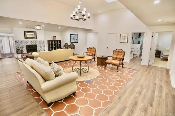 Chandelier, Fireplace, Interior, Living room, Recessed Lighting, Wood Texture Flooring