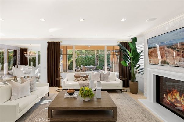 Chandelier, Dining room, Fireplace, Interior, Living room, Recessed Lighting, Wood Texture Flooring