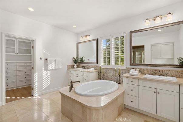Bathroom, Dual Sink Vanities, Interior, Recessed Lighting, Wood Texture Flooring
