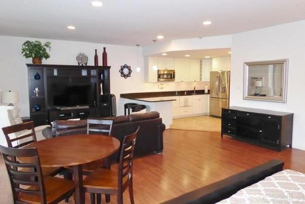 Dining room, Interior, Kitchen, Living room, Pendant Lights, Recessed Lighting, Stainless Steel Appliances, Wood Texture Flooring