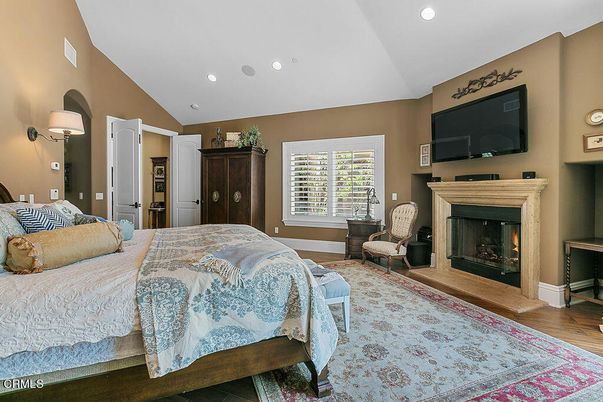 Bedroom, Fireplace, Interior, Recessed Lighting, Wood Texture Flooring