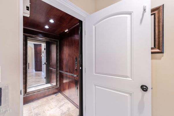 Elevator, Interior, Recessed Lighting, Wooden Ceilings, Wooden Walls