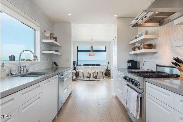 Dining room, Interior, Kitchen, Pendant Lights, Recessed Lighting, Stainless Steel Appliances, Water, Wood Texture Flooring