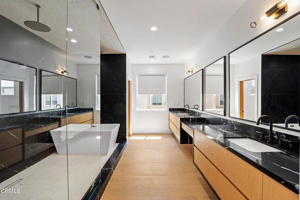 Bathroom, Dual Sink Vanities, Free Standing Baths, Interior, Recessed Lighting, Wood Texture Flooring