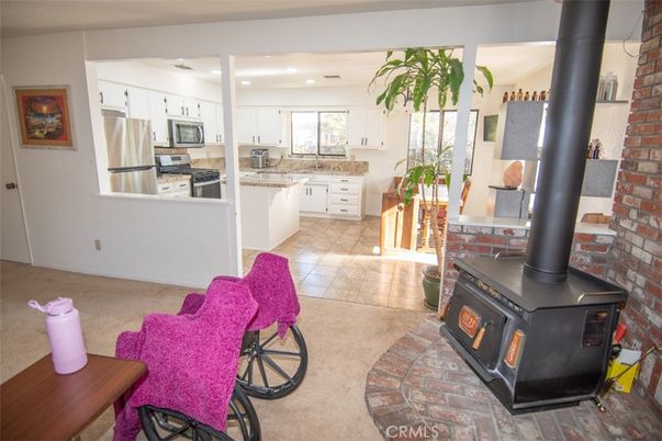 Interior, Kitchen, Recessed Lighting, Stainless Steel Appliances, Stone Walls
