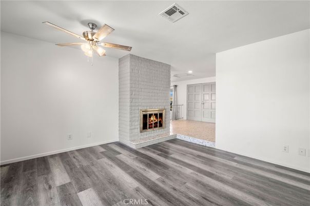 Empty room, Fireplace, Interior, Recessed Lighting, Wood Texture Flooring