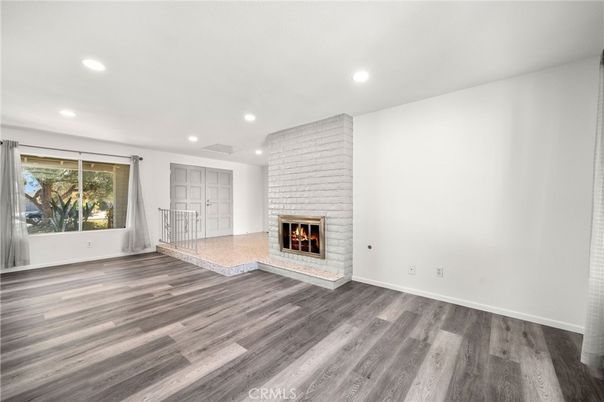 Empty room, Fireplace, Interior, Recessed Lighting, Wood Texture Flooring