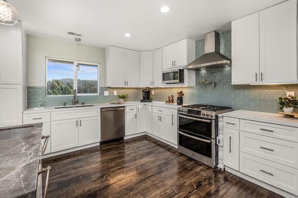Interior, Kitchen, Pendant Lights, Recessed Lighting, Stainless Steel Appliances, Wood Texture Flooring