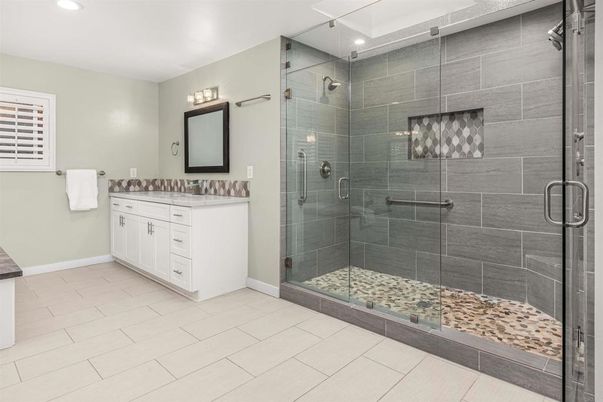 Fireplace, Interior, Kitchen, Pendant Lights, Recessed Lighting, Stainless Steel Appliances, Stone Walls, Wood Texture Flooring