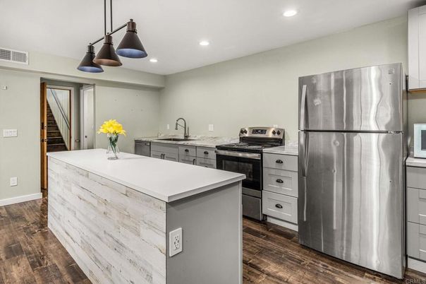 Interior, Kitchen, Pendant Lights, Recessed Lighting, Stainless Steel Appliances, Wood Texture Flooring
