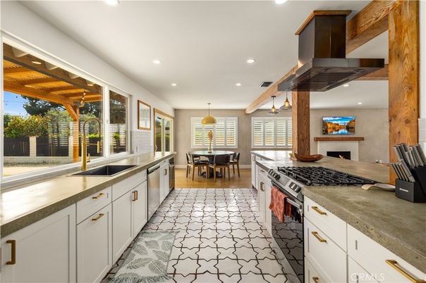 Dining room, Fireplace, Interior, Kitchen, Pendant Lights, Recessed Lighting, Stainless Steel Appliances