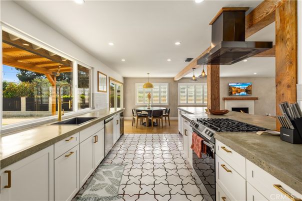 Dining room, Fireplace, Interior, Kitchen, Pendant Lights, Recessed Lighting, Stainless Steel Appliances
