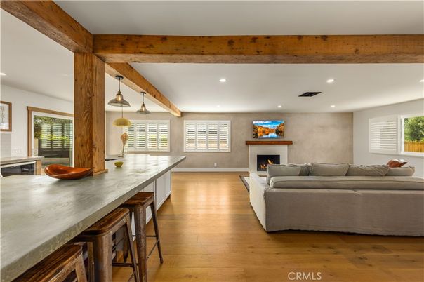 Fireplace, Interior, Living room, Pendant Lights, Recessed Lighting, Wooden Beams, Wood Texture Flooring
