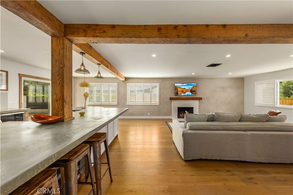 Fireplace, Interior, Living room, Pendant Lights, Recessed Lighting, Wooden Beams, Wood Texture Flooring