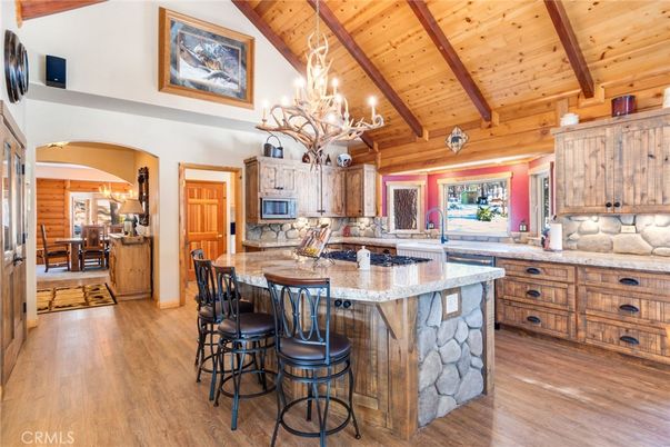 Chandelier, Dining room, Interior, Kitchen, Stainless Steel Appliances, Wooden Beams, Wooden Ceilings, Wood Texture Flooring