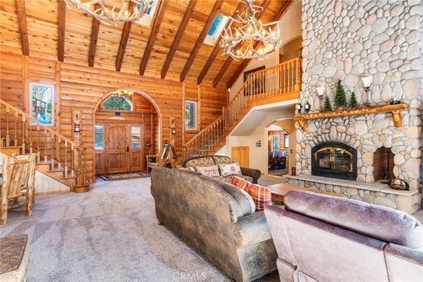 Chandelier, Fireplace, Interior, Living room, Stone Walls, Wooden Beams, Wooden Ceilings, Wooden Walls