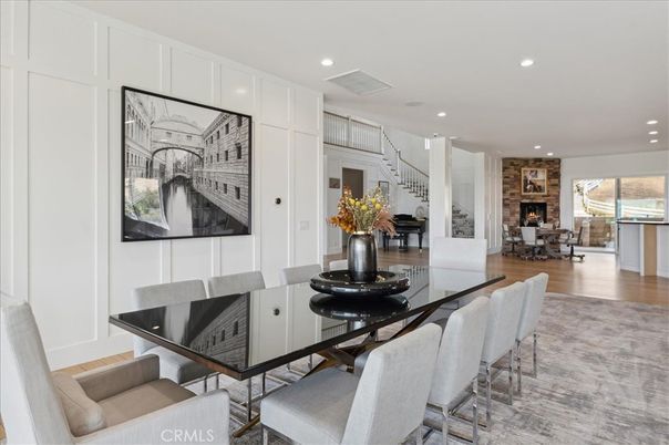 Dining room, Fireplace, Interior, Pendant Lights, Recessed Lighting, Stone Walls, Wood Texture Flooring