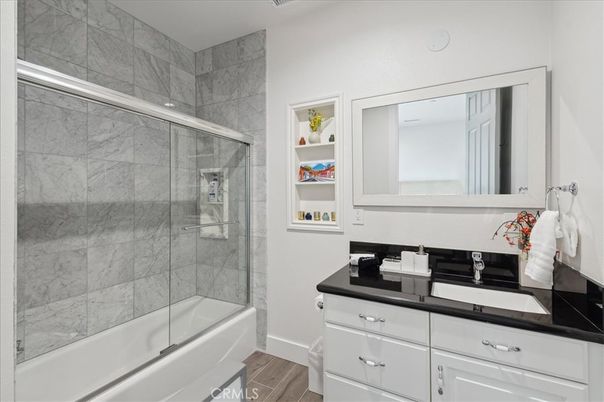 Bathroom, Glass Shower, Interior, Marble Walls, Wood Texture Flooring