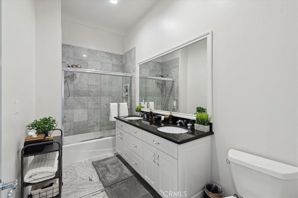 Bathroom, Dual Sink Vanities, Interior, Marble, Marble Walls, Recessed Lighting